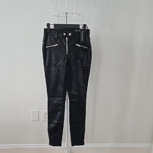 Blank NYC Black Skinny Jeans with Glossy Finish and Tapered Leg